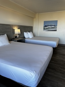 Double Queen Suite with Partial Ocean View Photo 1